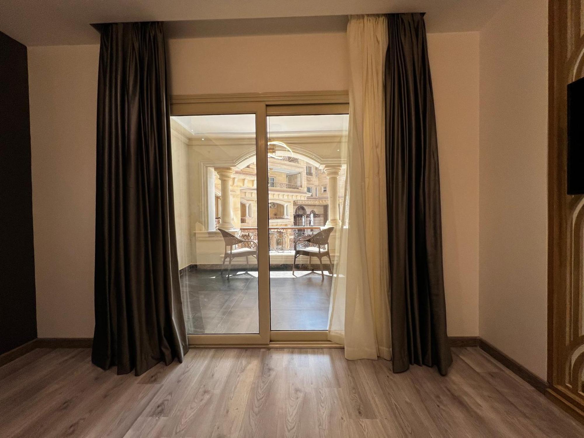 Onyx Pyramids Boutique Hotel Al Kawm al Akhdar 外观 照片